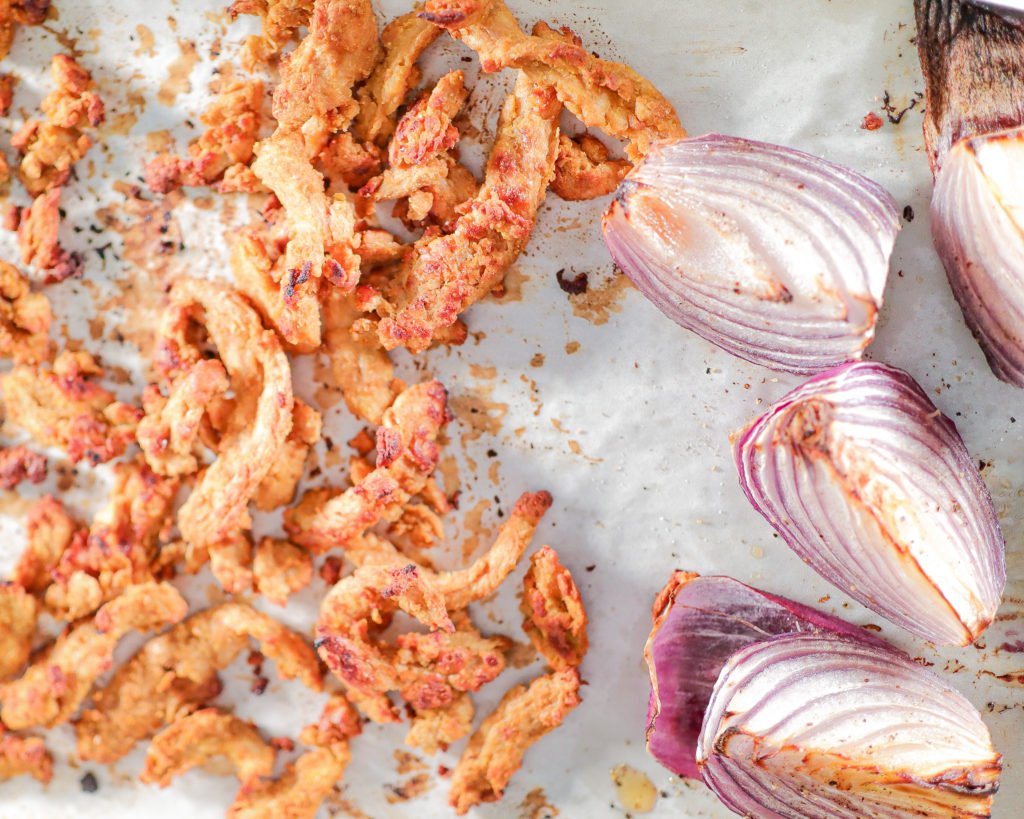 Baked soy curls and red onion.