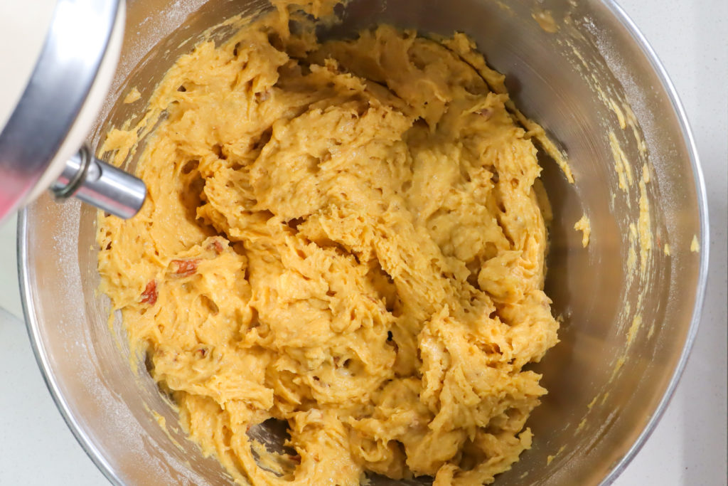 Muffin batter inside a mixing bowl.