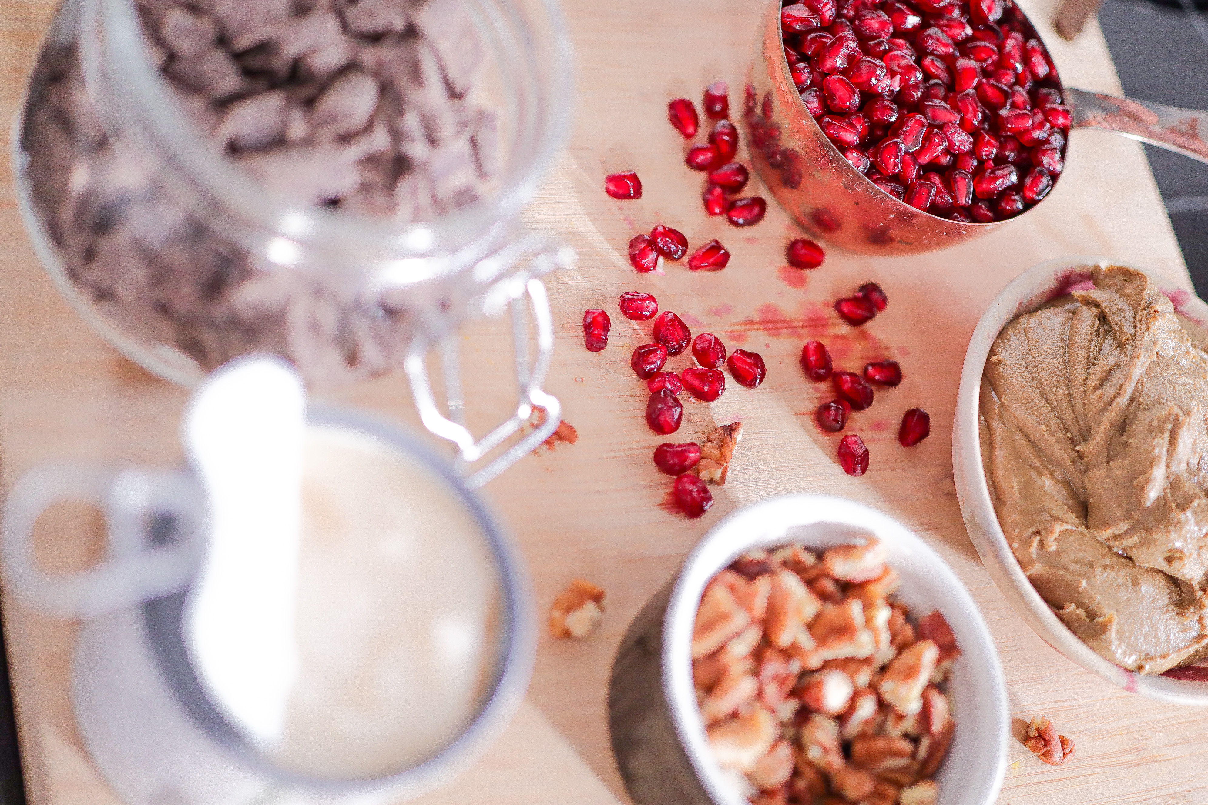 Ingredients displayed in jars, bowls, and cups.