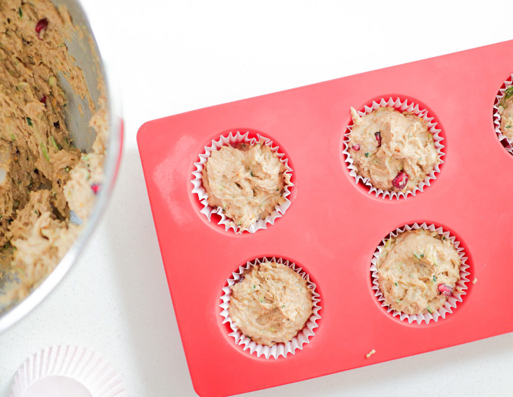 Bowl of muffin batter with silicone muffin mold