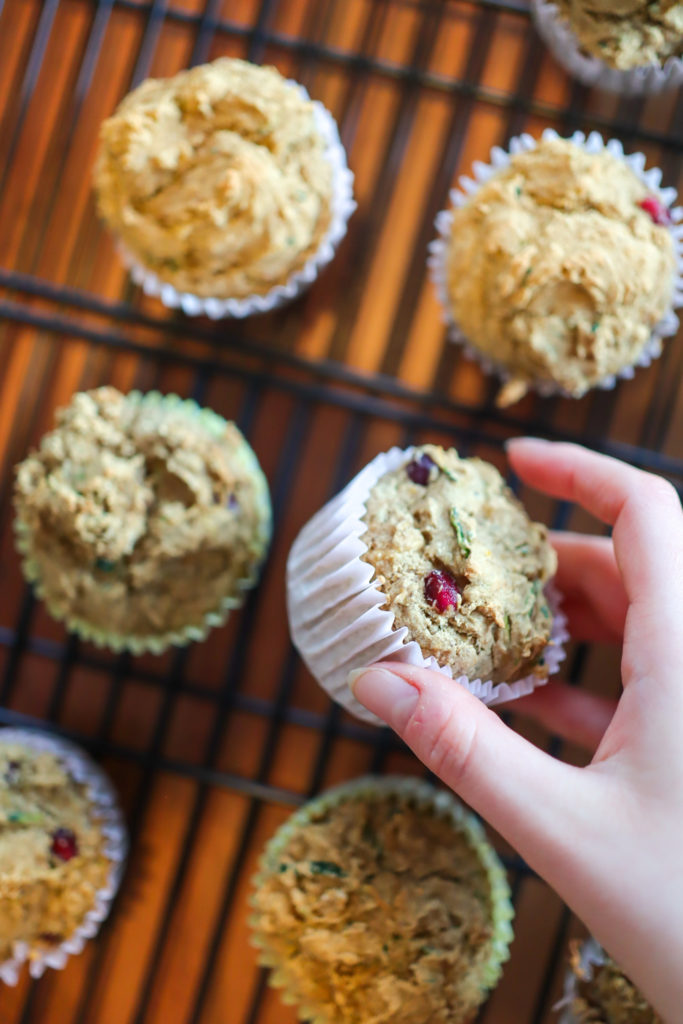 hand holding a freshly baked muffin