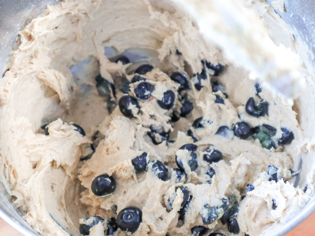 mixing bowl of blueberry muffin batter