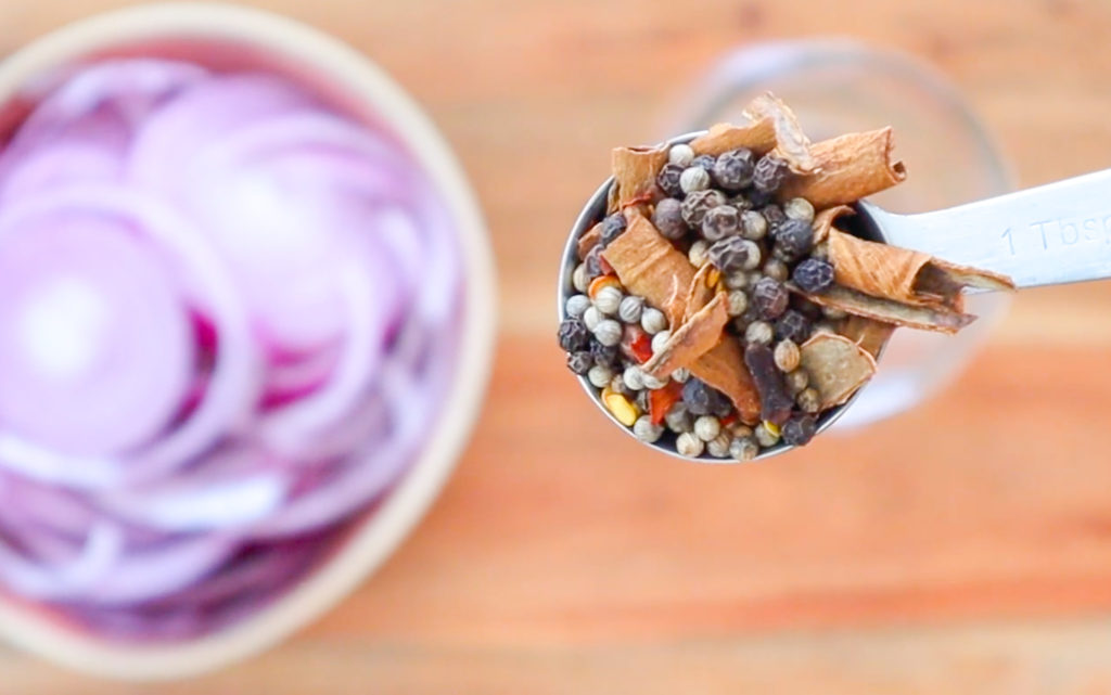 close-up shot of spoon full of whole spices