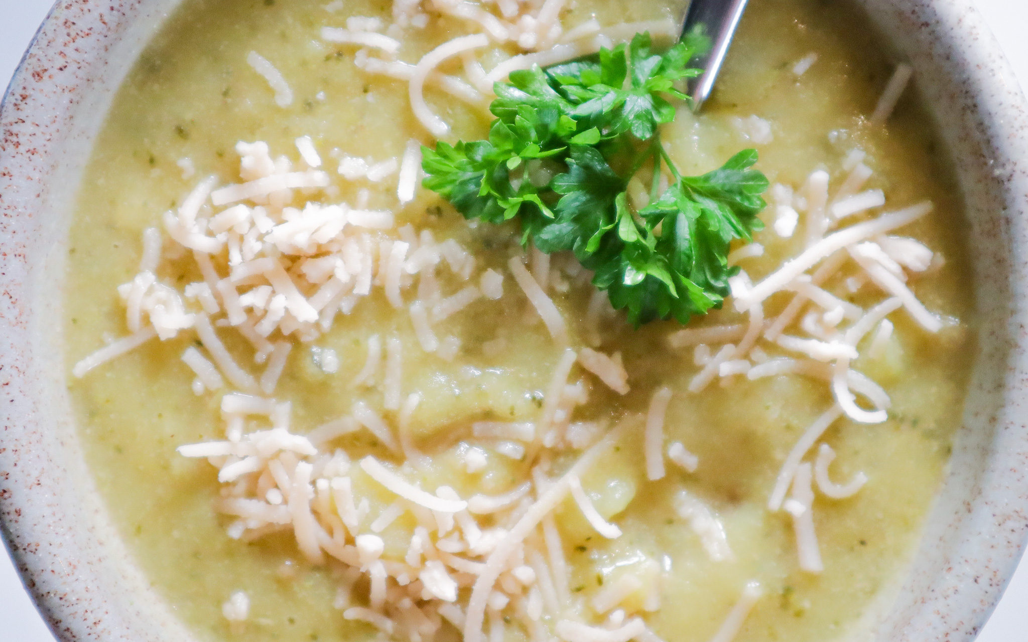 bowl of vegan broccoli cheese soup